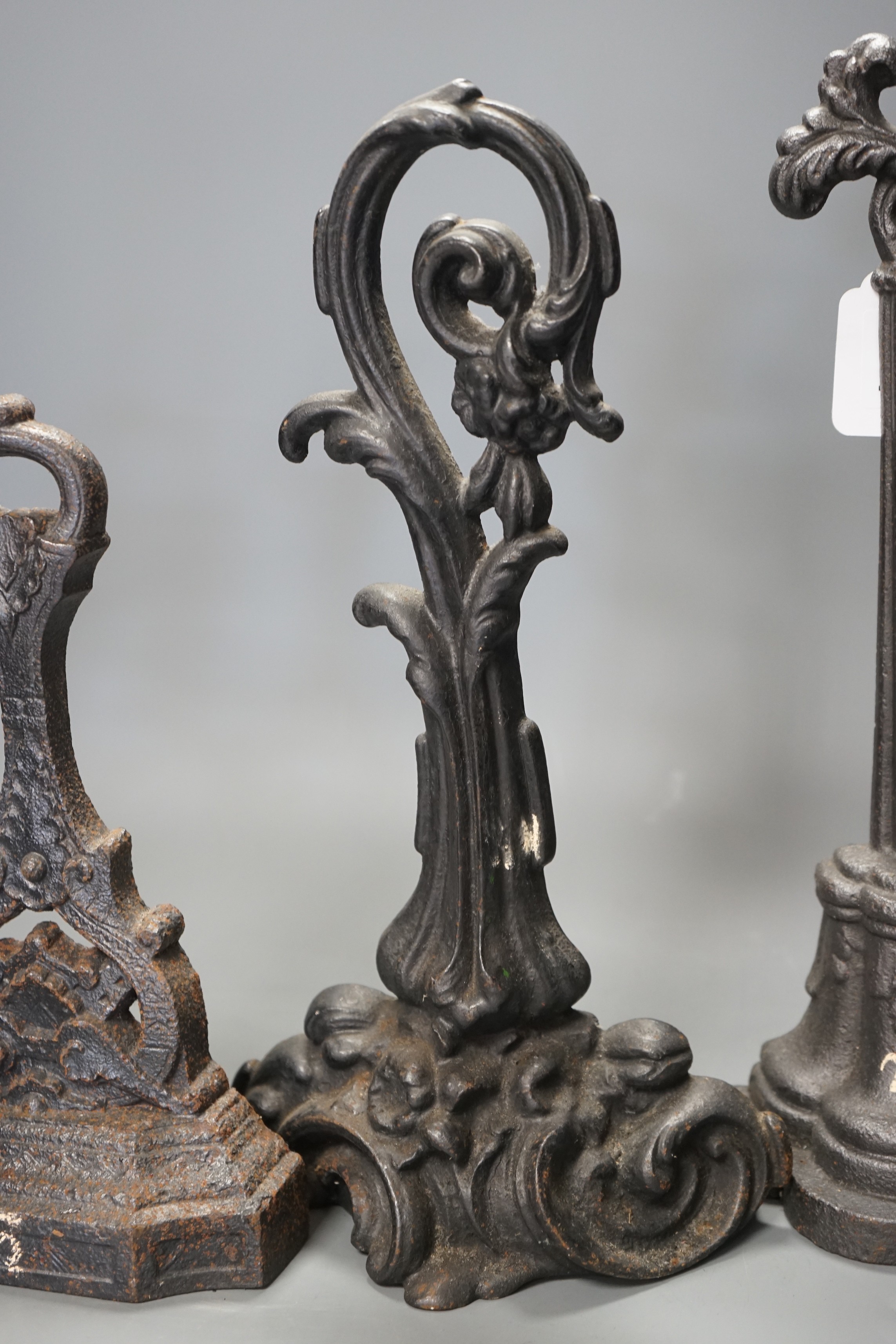 Four assorted Victorian cast iron doorstops, tallest 38cm